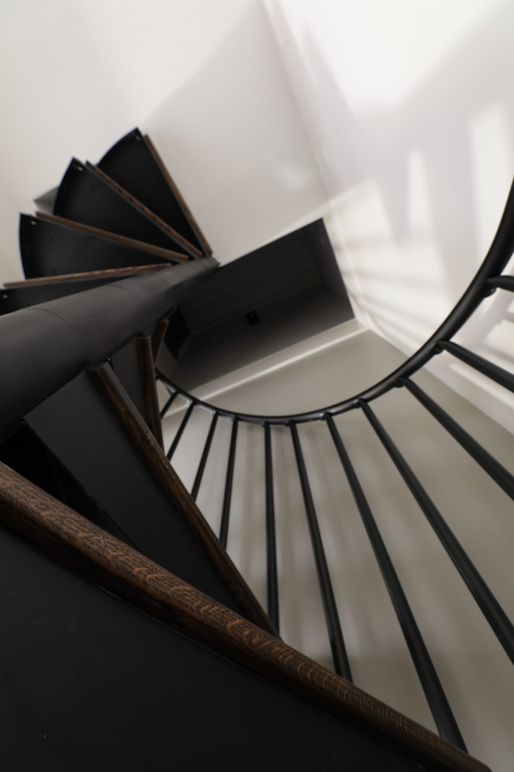 Looking up the spiral staircase in the King Loft Suite