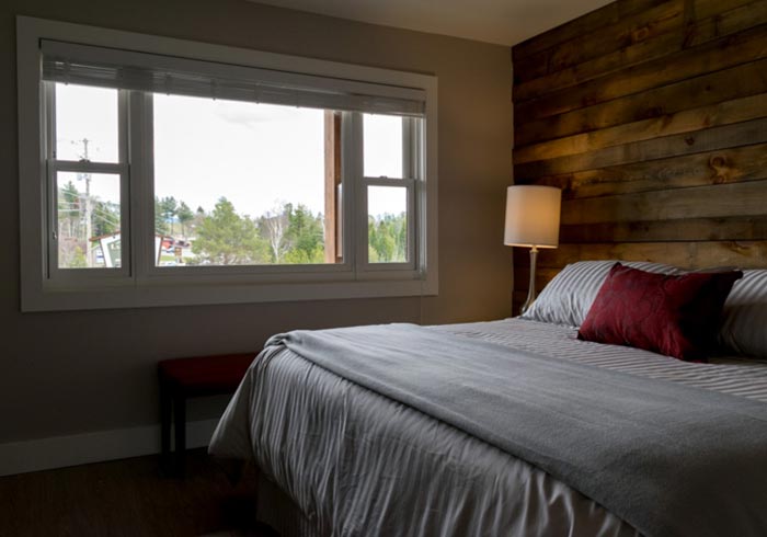 Bedroom with large bed and window