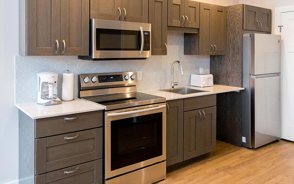 Kitchen with grey cabinets